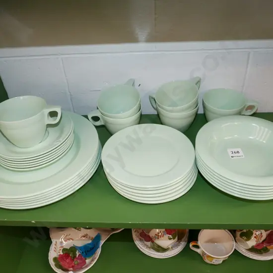 various Falcon Duraware plastic bowls, plates, cups, saucers