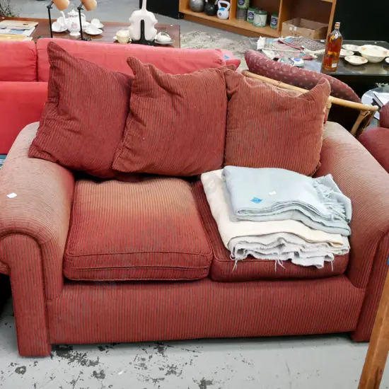 striped rolled arm 2 seater settee with 3 matching cushions - red striped - significant fading