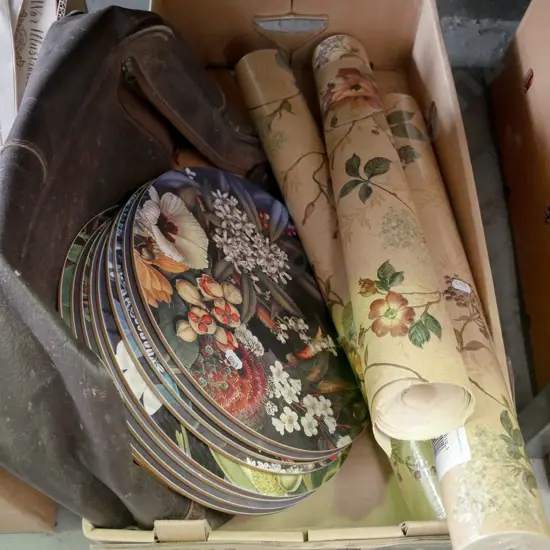 box; floral wall paper, leather satchel, placemats