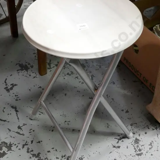 chrome and plastic foldaway stool