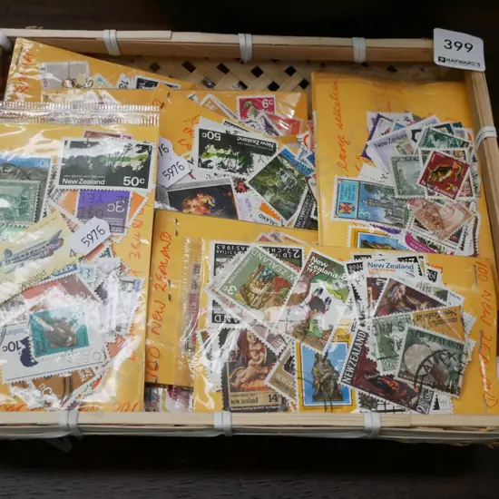 cane basket and stamps