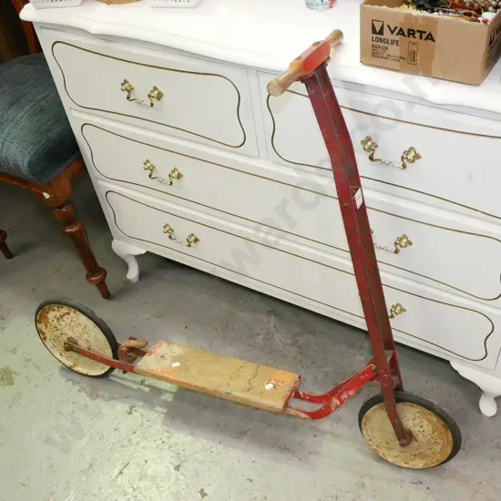 vintage child's ride on scooter
