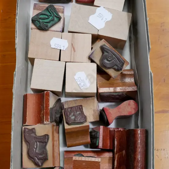 box of wood and rubber stamps
