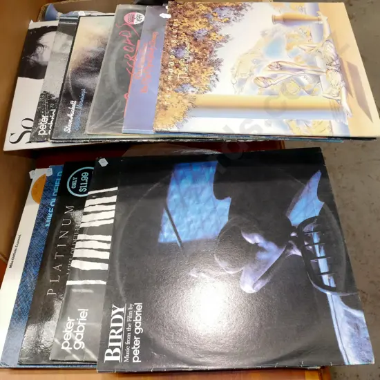 stack of LPs; Moody Blues, Rycooder etc