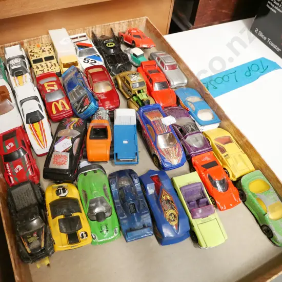 box of toy vehicles