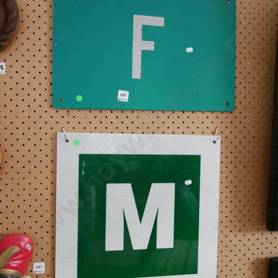2x signs on tin - green dots