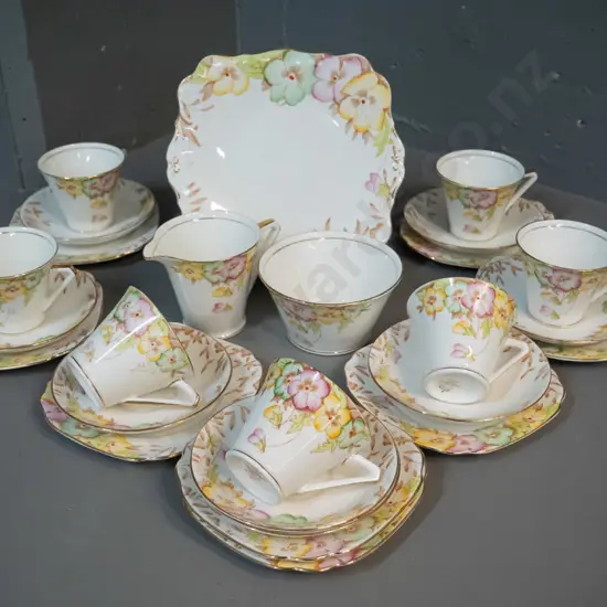 Bell English china tea set - 7 trios, cake plate, cream & sugar, spare saucer and plate