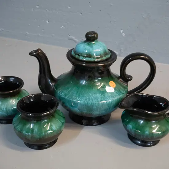 Blue Mountain pottery 4-piece tea set including teapot H-190 W-240. 2 sugars - some sticky tape residue