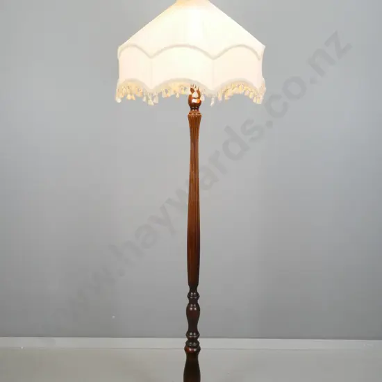 mahogany standard lamp with turned and fluted column & round base on 3 bun feet with waisted fringed shade H-1680