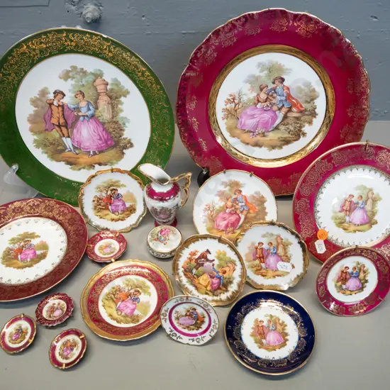 assorted Limoges romance scene china items - 2 cabinet plates, 2 small plates, jug, lidded pill box etc. Largest plate