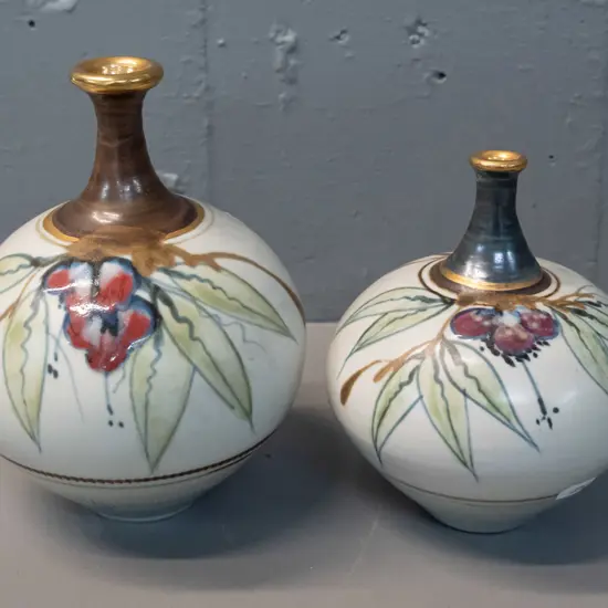 2 Neil Grant pottery vases with gilt decoration - larger is H-180 D-130