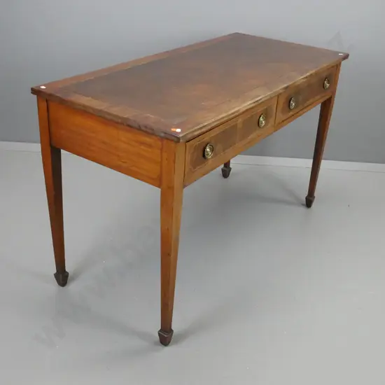 19th century library table on square tapered legs, spade feet, inlaid stringing to legs and drawer fronts, brass drop