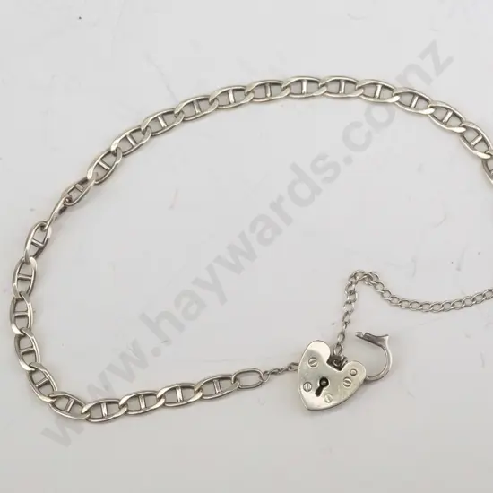 silver bracelet with heart clasp and safety chain stamped 925