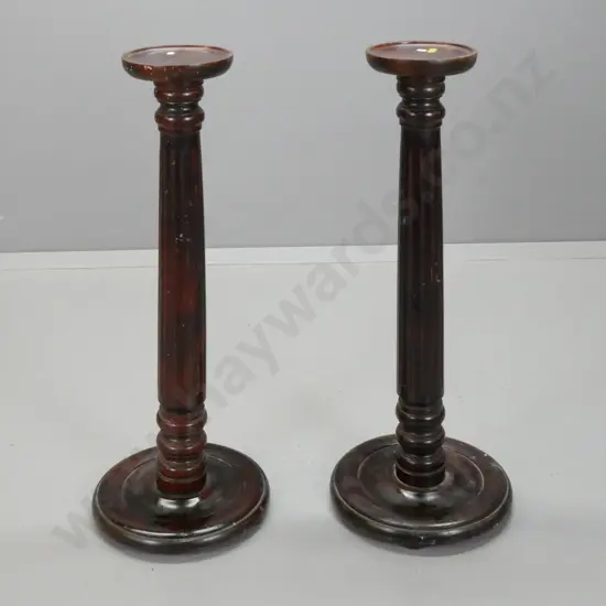 pair of vintage dark stained rimu plant / display stands with turned & fluted stems on round turned bases - splitting to