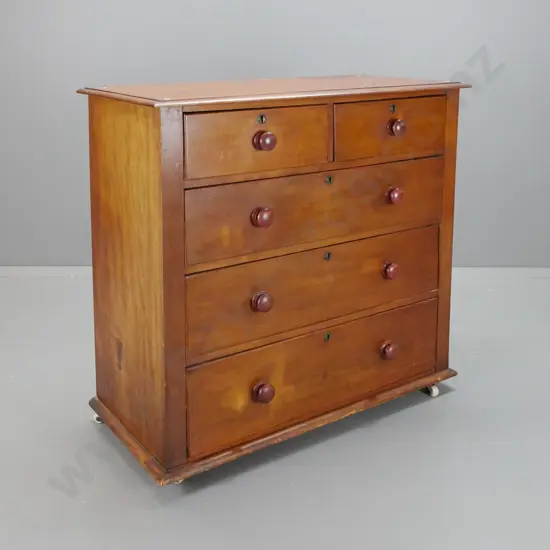 colonial kauri 5-drawer chest with timber knobs, brass locks and escutcheons, on porcelain casters - staining and water