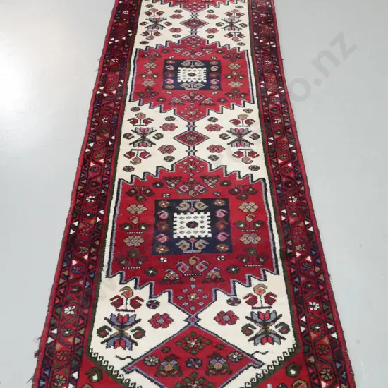 Persian style hand-knotted wool runner - ivory, dark reds and blues - minor staining in lighter areas L2840 W810