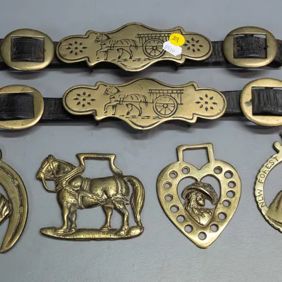 assorted horse brasses - 2 sets of 3 buckles on leather straps and 4 loose horse brasses. Straps L-265