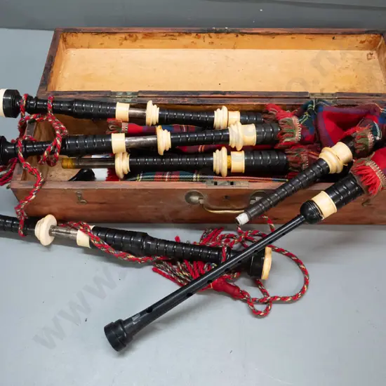 set of bagpipes in pine case with hinged lid - some damage and wear. Case is H-160 W-640 D-180