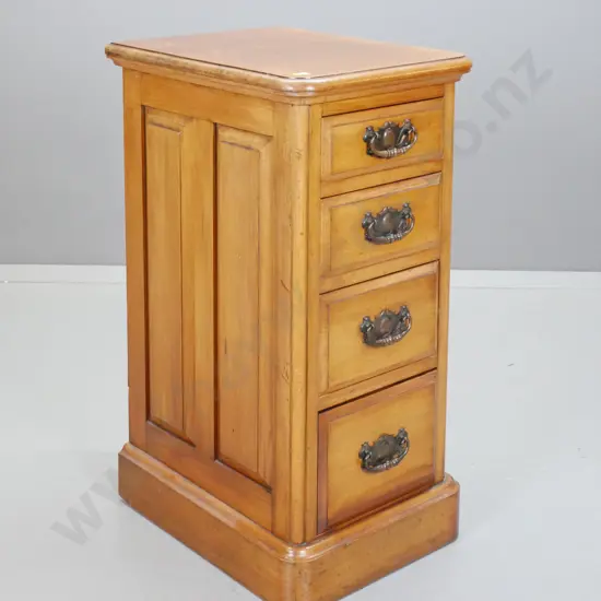 VIctorian rimu 4-drawer pedestal / small chest with pressed metal handles, panelled sides, on plinth base. Has filled