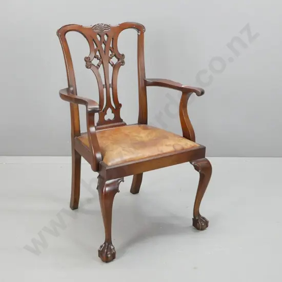 vintage Chippendale style open-armed armchair with pierced back splat, leather pop-out seat, claw & ball front feet -