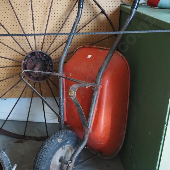 red metal wheelbarrow