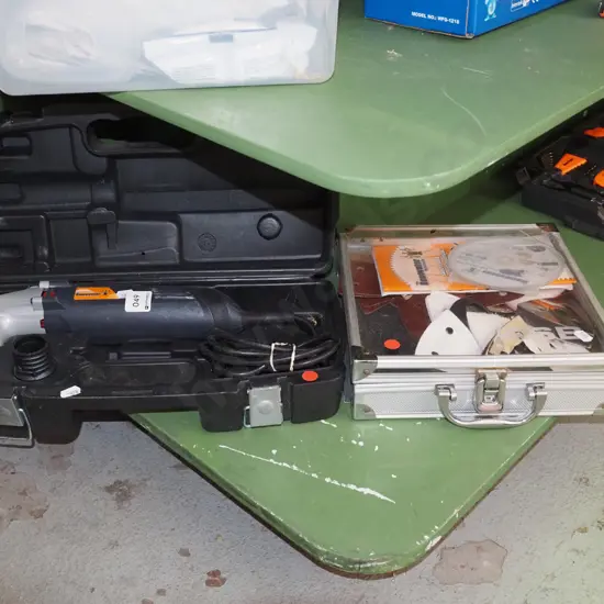 cased Renovator tool with case of various accessories - red dots