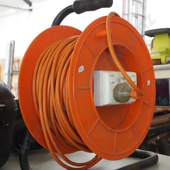orange extension cord and reel