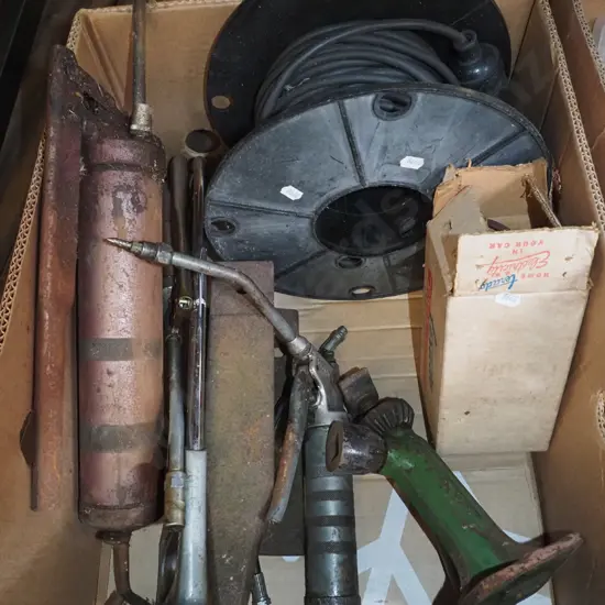 box; extension cord, car jack, grease guns etc