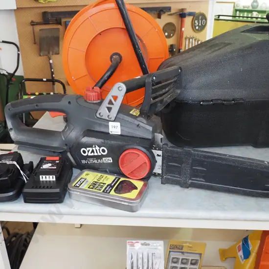 Ozito battery powered chainsaw with additional blades