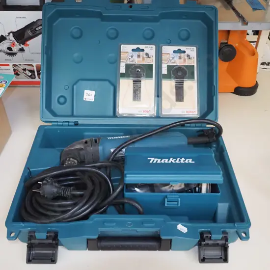 cased Makita multi tool and sccessories
