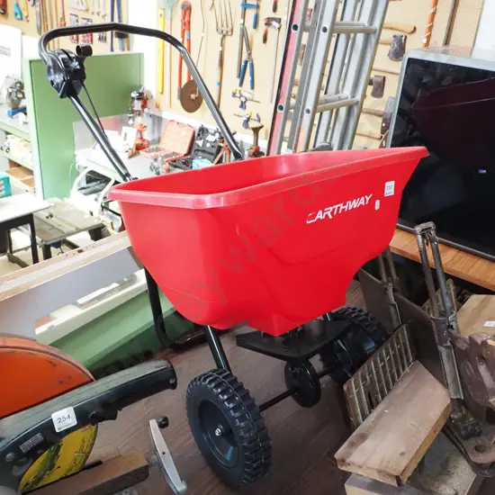 Earth Way push along fertiliser spreader