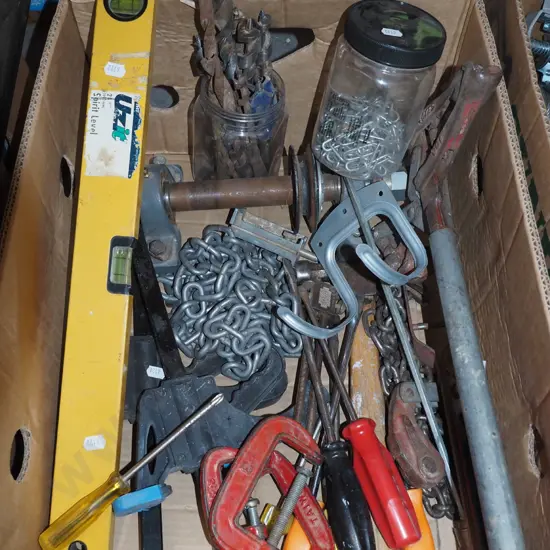 box; builder's levels, drill bits, wire strainer etc