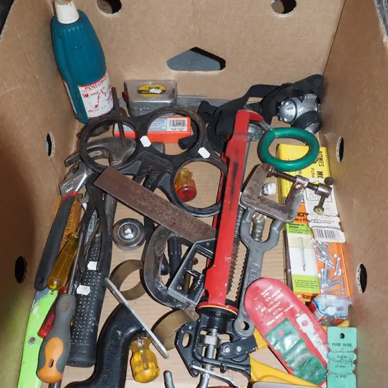 box; caulking gun, hammer, adjustable crescent etc