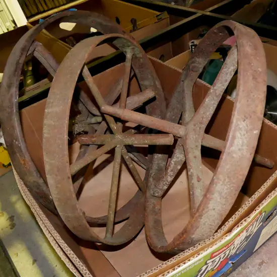 box of 3x rusty vintage wheelbarrow wheels
