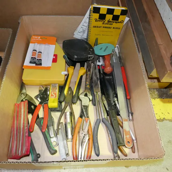 box; tin snips, allen key sets, adjustable crescents etc