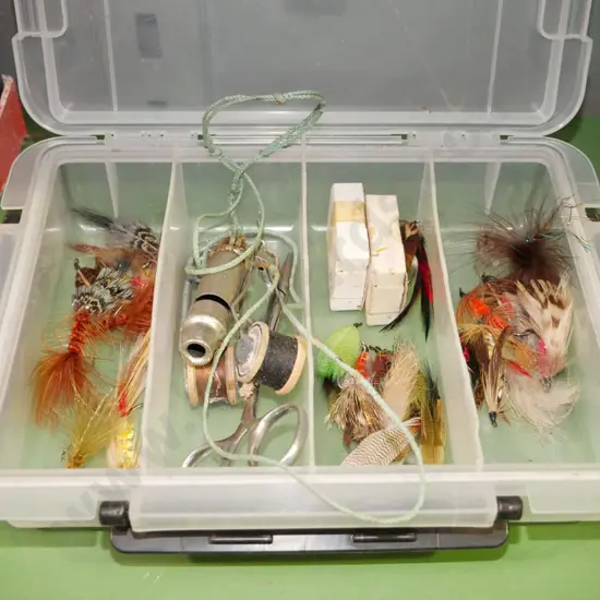 tackle box; flies, whistle etc
