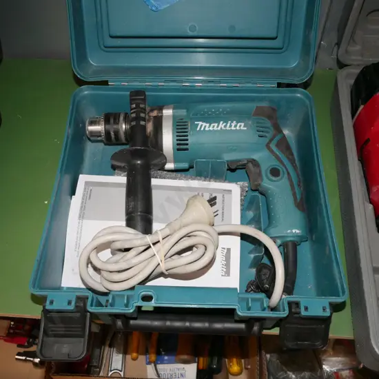 Makita cased electric drill