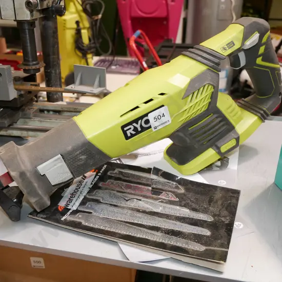 Ryobi battery powered reciprocating saw with additional blades - no battery
