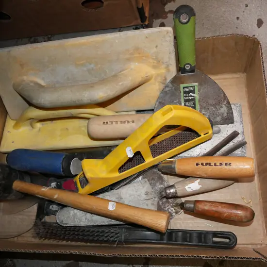 box; plaster float, wire brush, rubber mallet etc