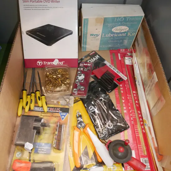 box; metal shapes, lubricant kit, allen keys etc