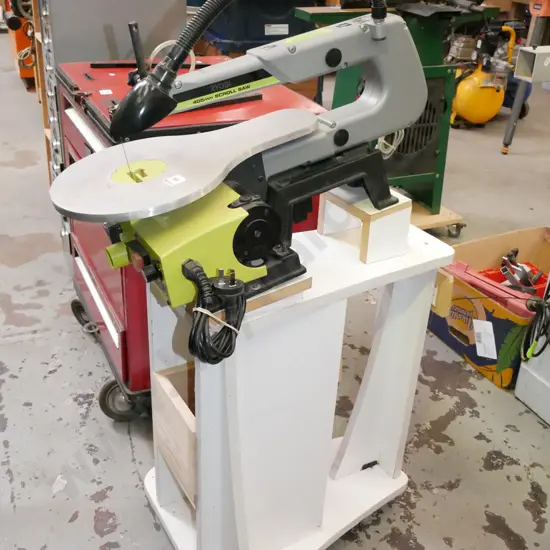 Ryobi 455mm scroll saw with adjustable light fitting on homemade stand and accessories
