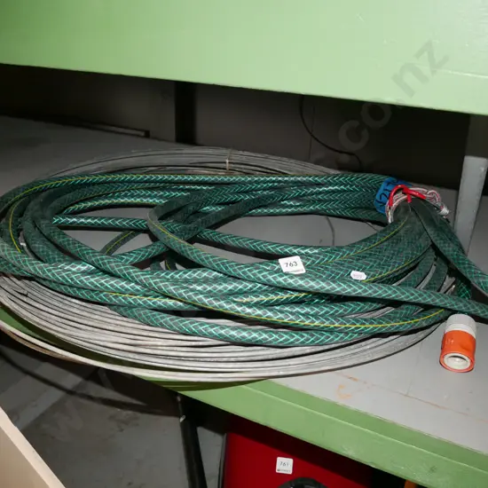 garden hose, roll of metal wire