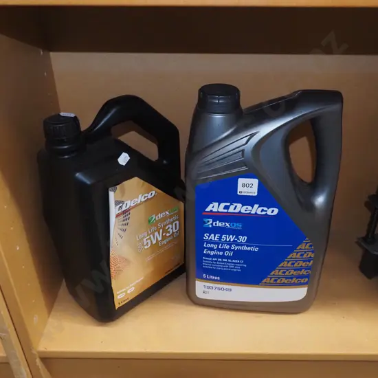 2x bottles of synthetic engine oil