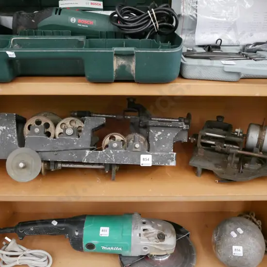 shelf of assorted machine parts