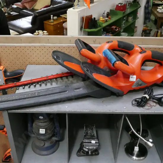 2x B&D Firestorm hedge trimmers - both have batteries, only 1 charger