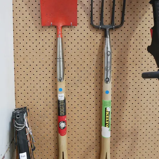 small wooden handled fork and spade