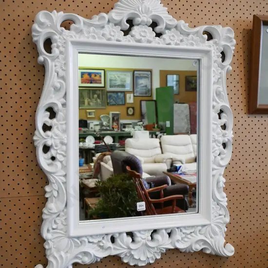 ornate white plastic wall mirror