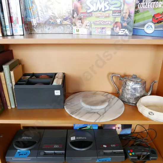 shelf; chocolate fondu kit, books, plated tea pot etc