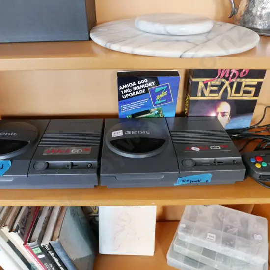 2x Commodore Amiga 32 bit video game consoles - no cords -  As Is No Returns