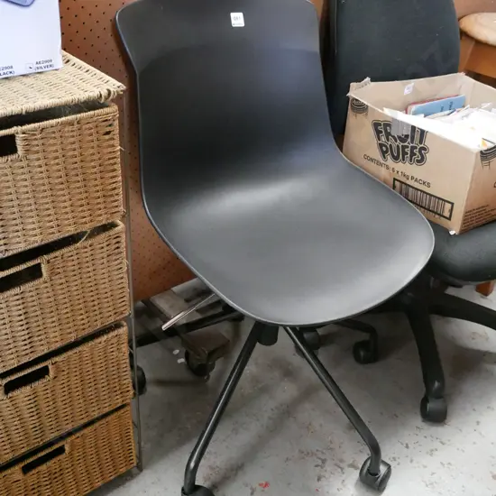 black plastic office chair